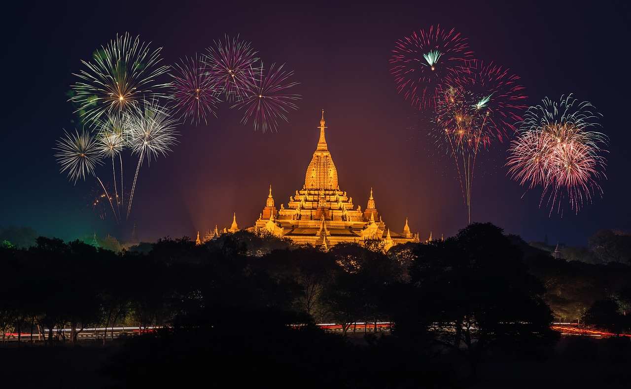 The massive golden Shwedagon Pagoda glowing at sunset in Yangon, Myanmar.